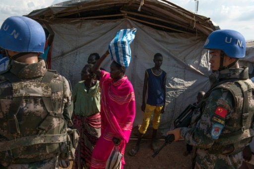 © اف ب | جنود من الامم المتحدة في مخيم للنازحين في جوبا 3 سبتمبر 2016